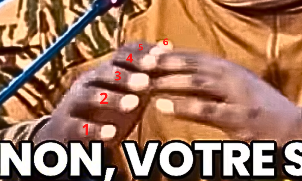 La main d'Ibrahim Traoré comporte six doigts. Les IA de mauvaise qualité produisent régulièrement cette erreur.